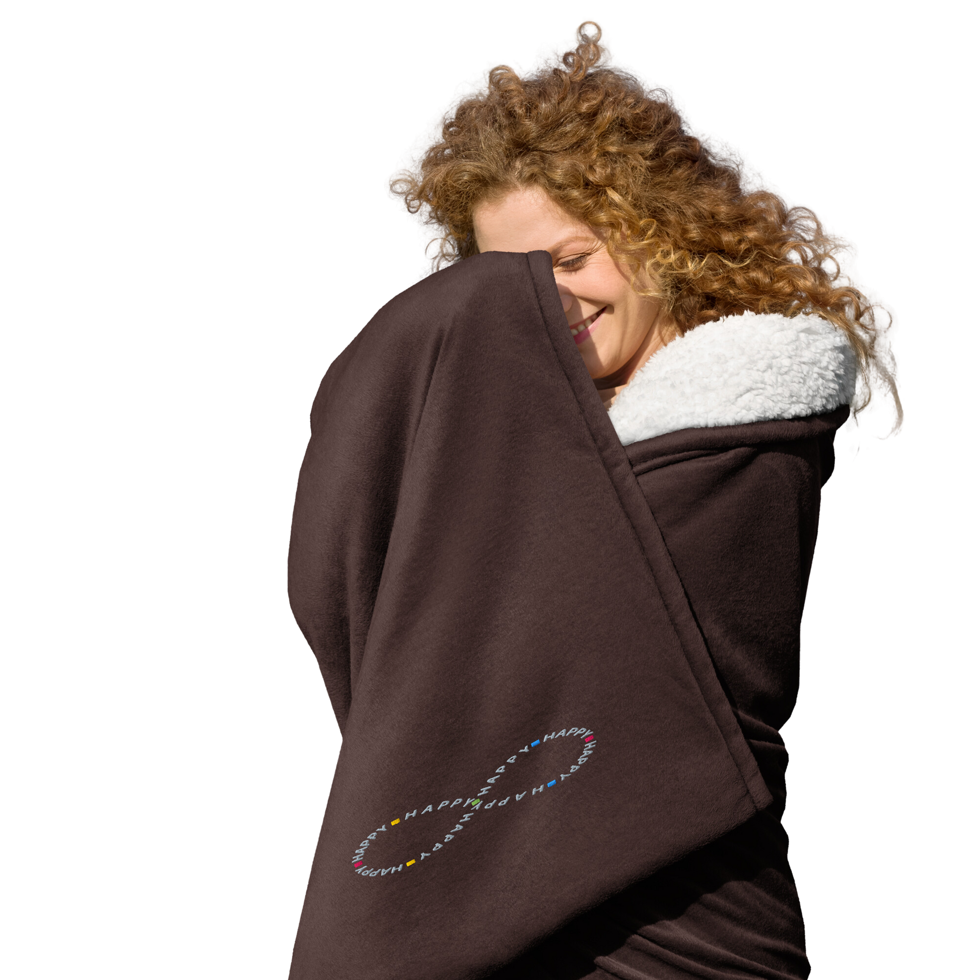 Happy young woman wrapped in soft brown sherpa throw blanket with a happy embroidered infinity symbol HappyStuff