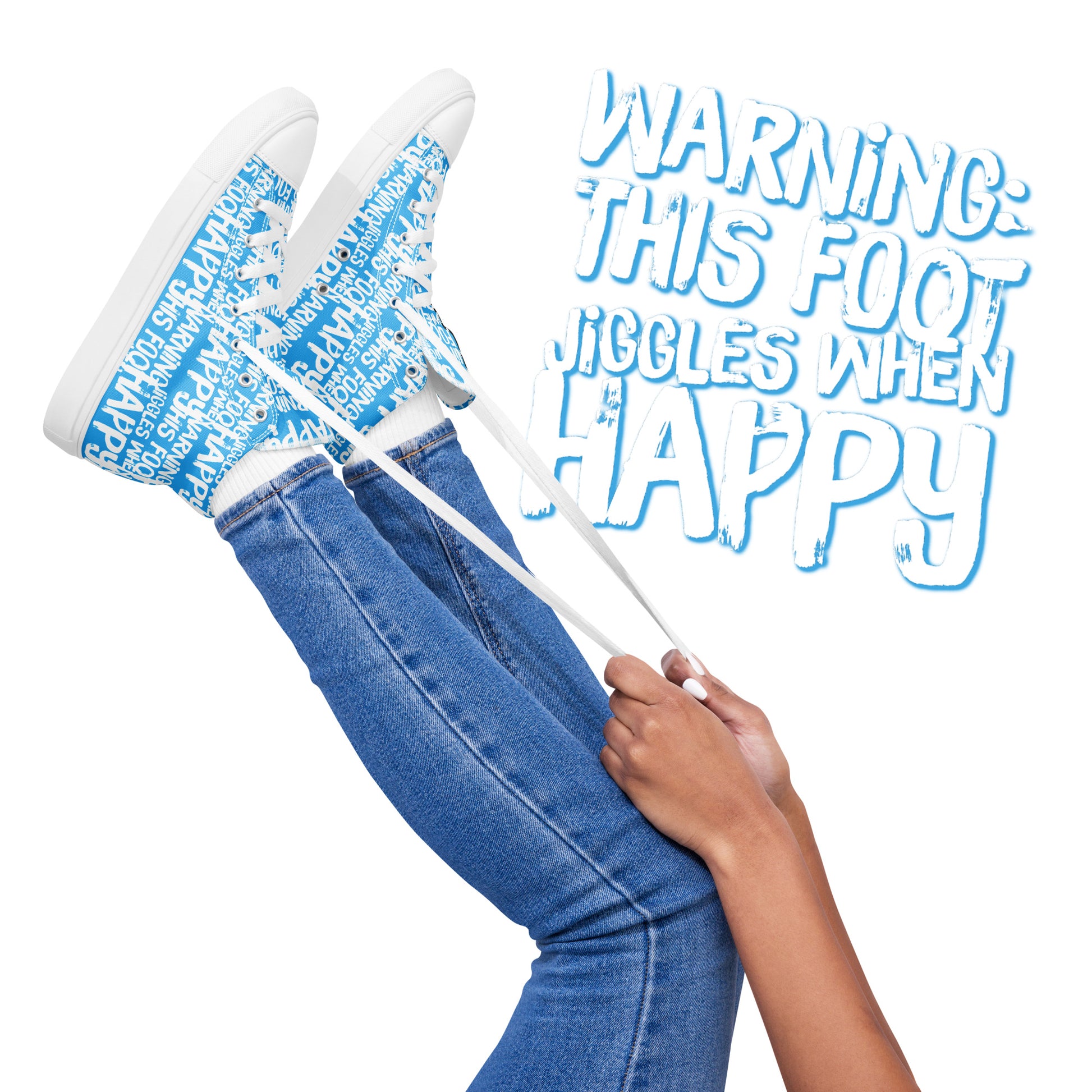 Womens feet in the air holding laces of HappyStuff blue and white high tops fun print Warning This Foot Jiggles When Happy