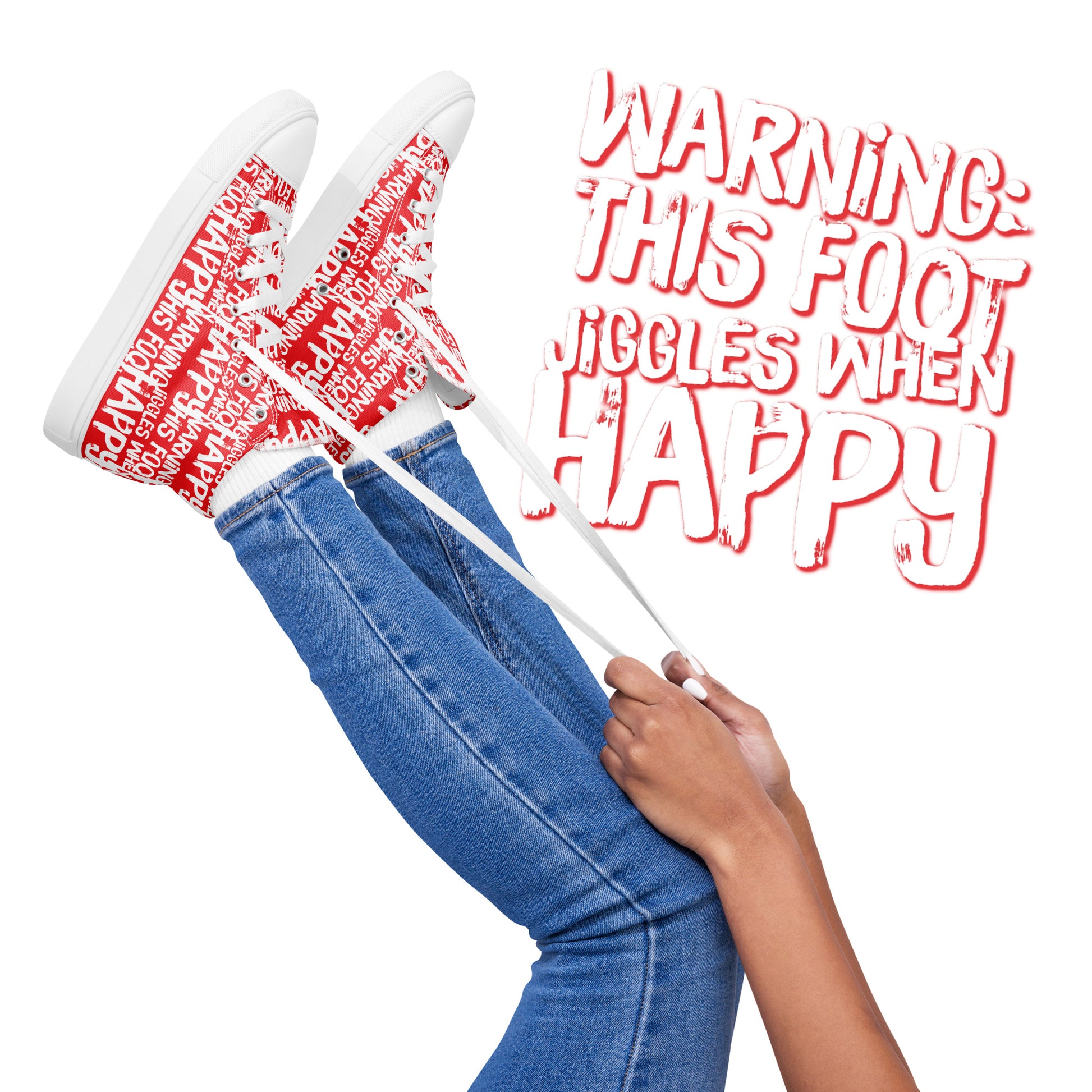 Womens feet in the air holding laces of HappyStuff red and white high tops fun print Warning This Foot Jiggles When Happy