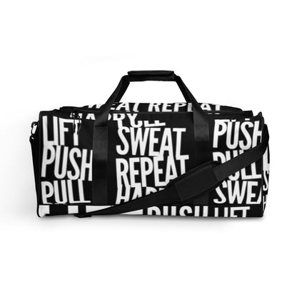 Side view Duffle bag Lift Push Pull Sweat Repeat Happy all over print black and white gym bag adjustable shoulder strap padded handles HappyStuff Brand