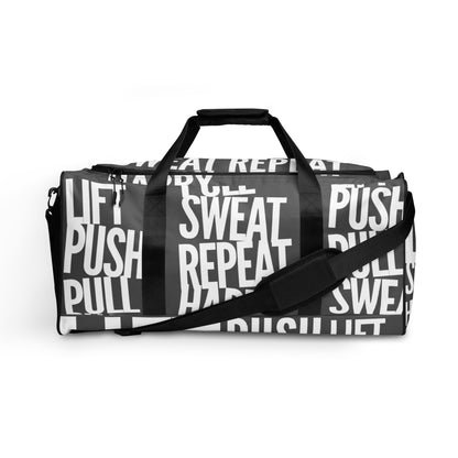 Side view Duffle bag Lift Push Pull Sweat Repeat Happy all over print slate grey and white gym bag adjustable shoulder strap padded handles HappyStuff Brand