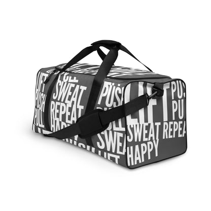 Duffle bag Lift Push Pull Sweat Repeat Happy all over print slate grey and white gym bag adjustable shoulder strap padded handles front side angle HappyStuff Brand