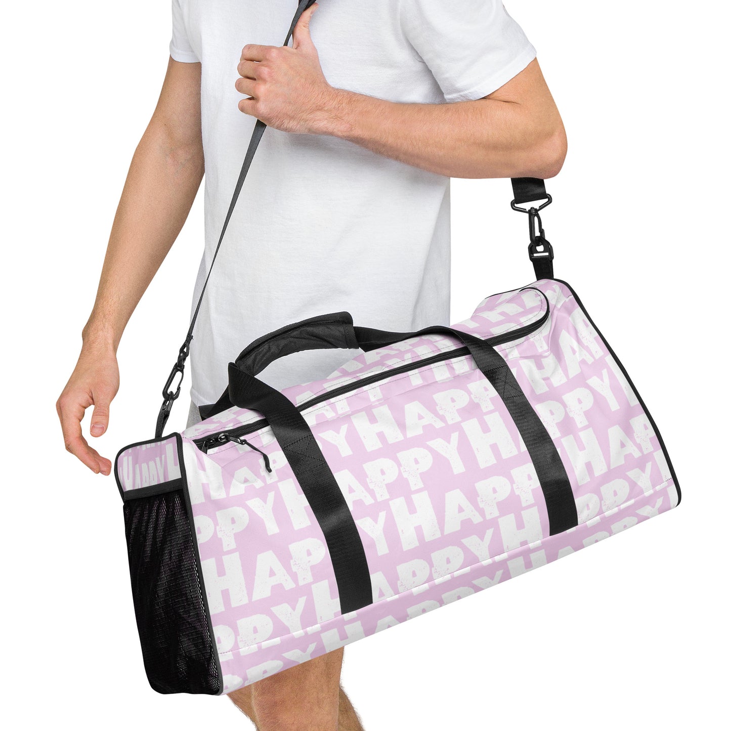 Duffle bag Happy sponge print black and white on pink water-resistant durable gym bag HappyStuff Brand Side view hanging on mans left shoulder