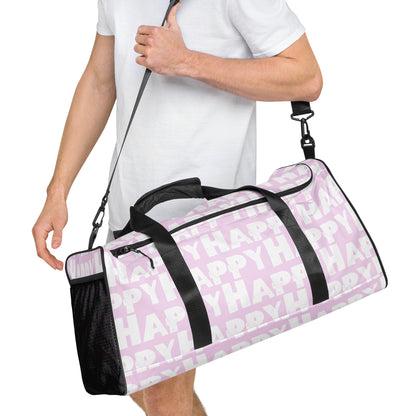 Duffle bag Happy sponge print black and white on pink water-resistant durable gym bag HappyStuff Brand Side view hanging on mans left shoulder