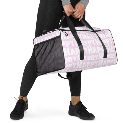 Hands carrying Duffle bag Happy sponge print black and white on pink water-resistant durable gym bag padded handles HappyStuff Brand