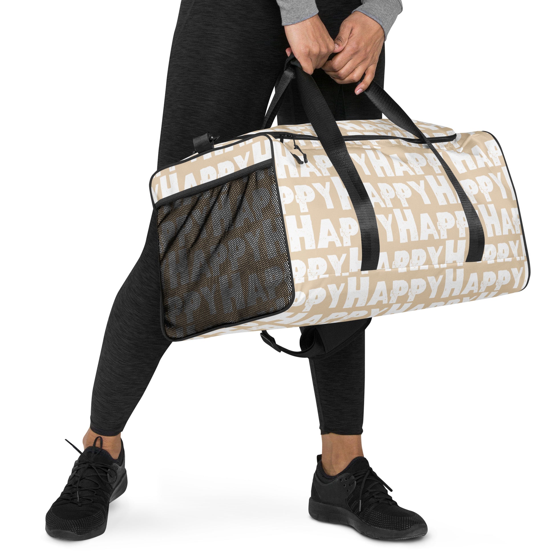 Hands carrying Duffle bag Happy sponge print black and white on beige water-resistant durable gym bag padded handles HappyStuff Brand