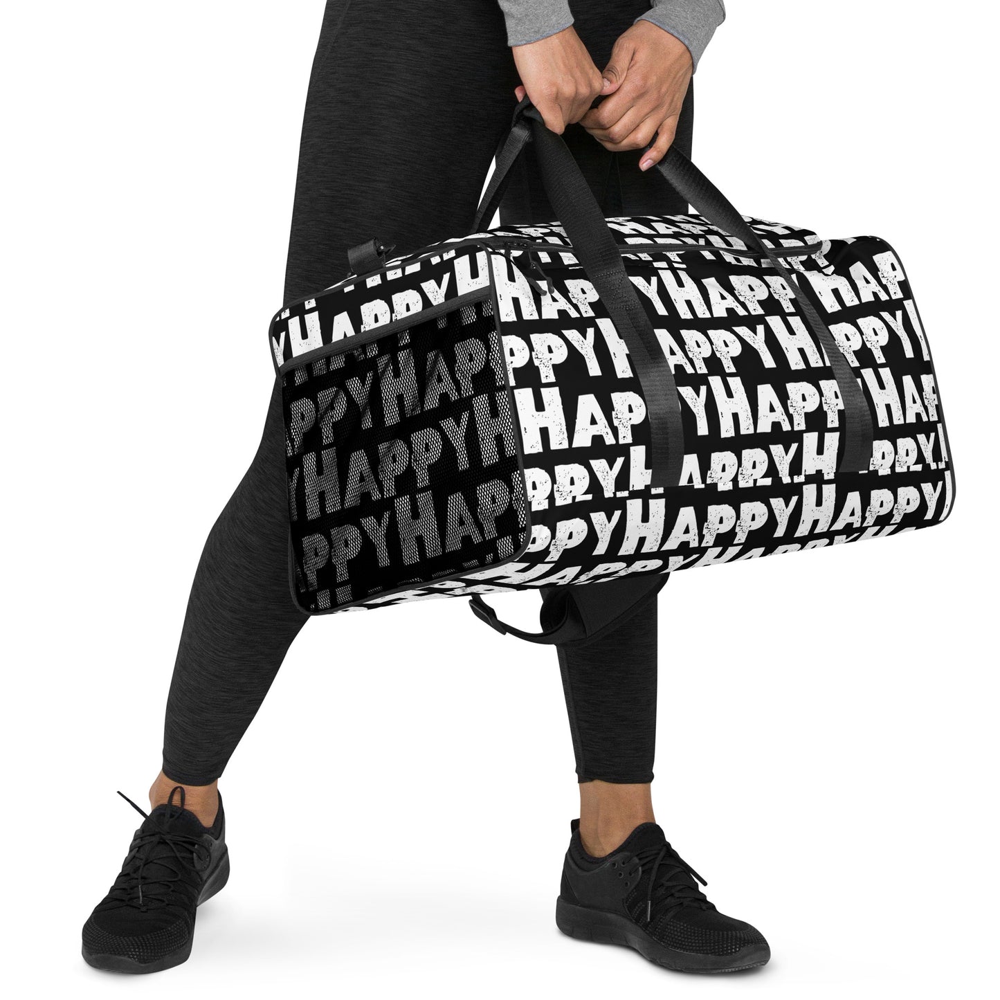 Hands carrying Duffle bag Happy sponge print black and white water-resistant durable gym bag padded handles HappyStuff Brand