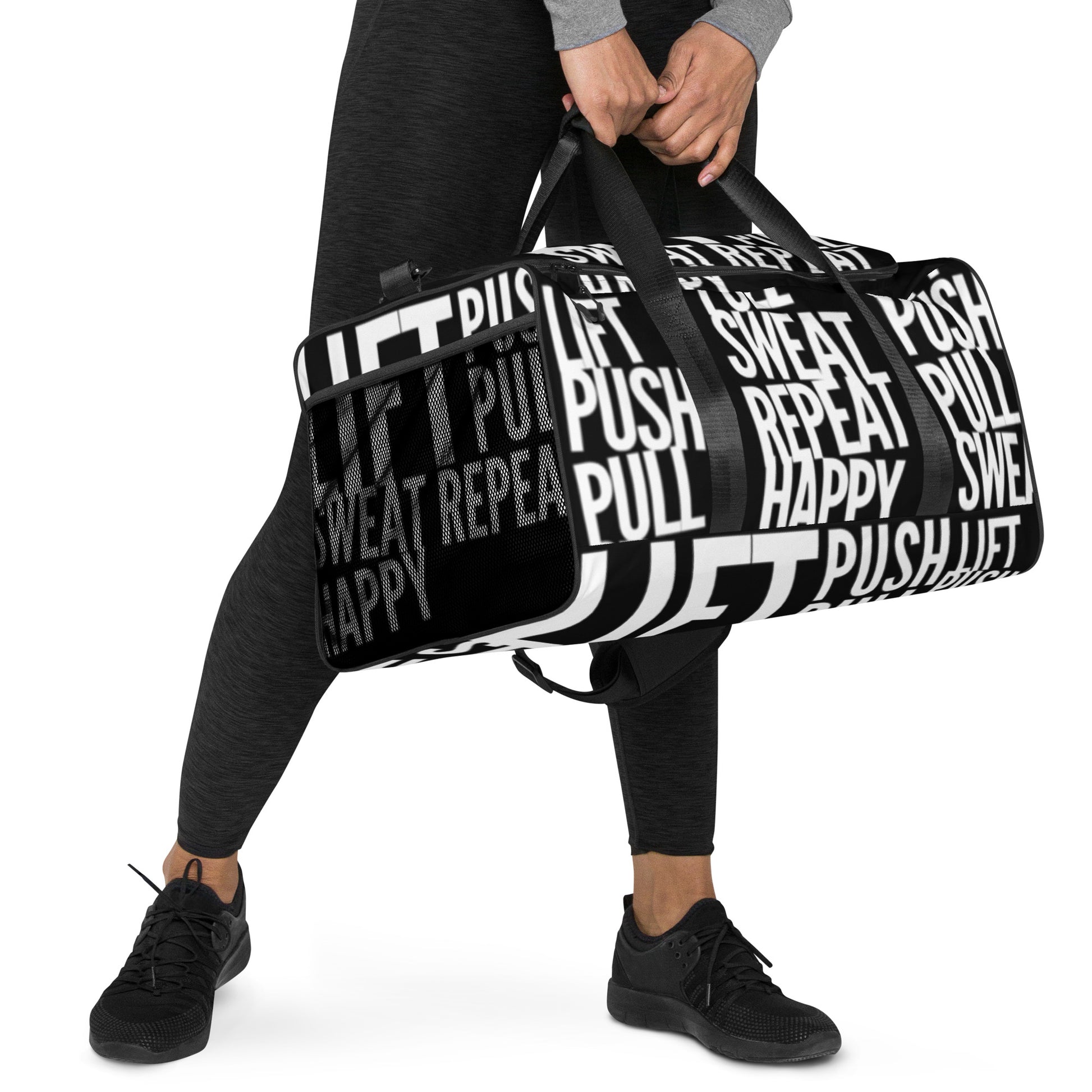 Hands carrying Duffle bag Lift Push Pull Sweat Repeat Happy all over print black and white gym bag padded handles HappyStuff Brand