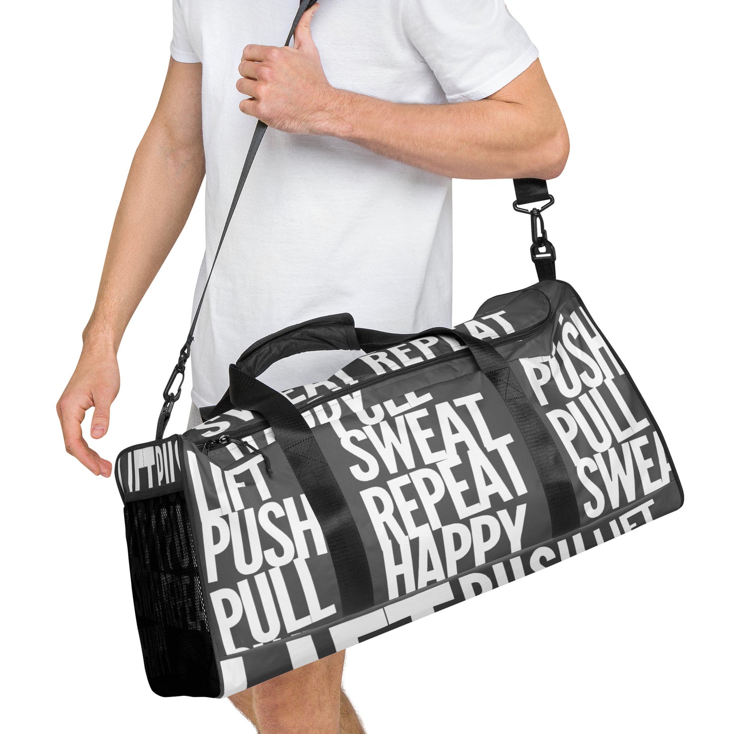 Duffle bag Lift Push Pull Sweat Repeat Happy all over print in slate grey with white gym bag HappyStuff Brand Side view hanging on mans left shoulder