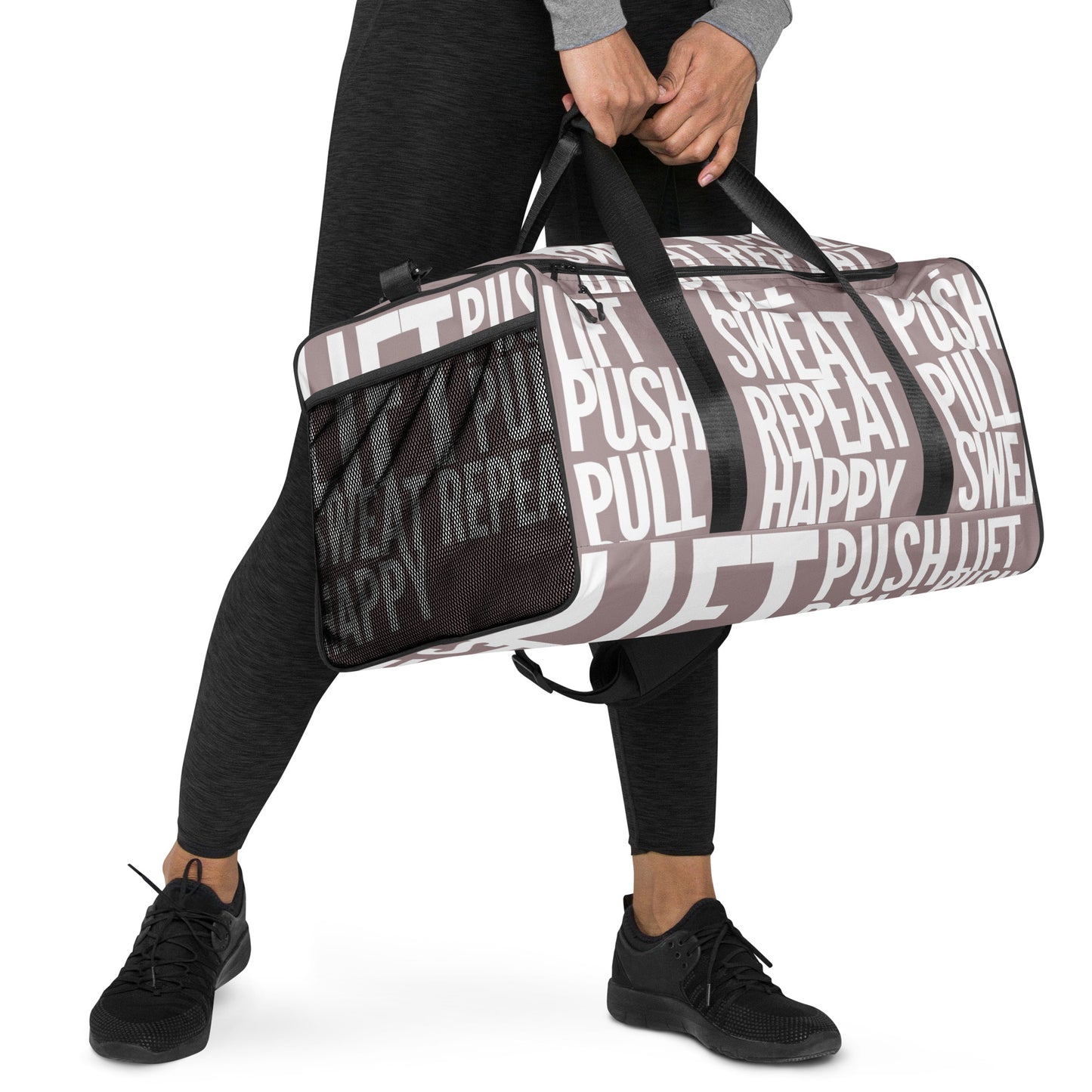 Hands carrying Duffle bag Lift Push Pull Sweat Repeat Happy all over print taupe and white gym bag padded handles HappyStuff Brand