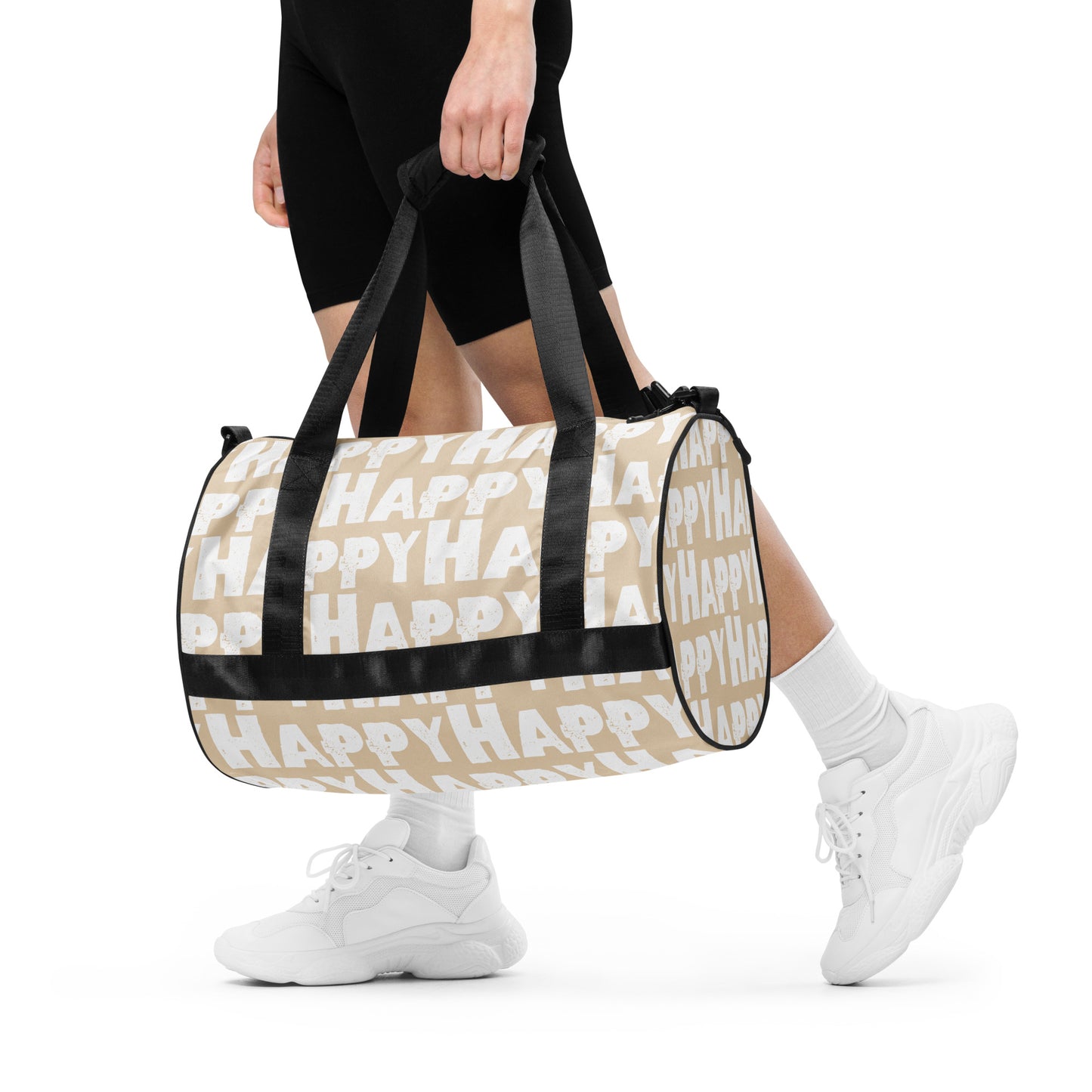 Woman carrying gym bag Happy sponge print black white on beige water-resistant durable small duffle bag padded handles HappyStuff Brand