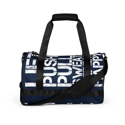 Gym bag navy blue and white all over print Lift Push Pull Sweat Repeat Happy HappyStuff Brand small duffle bag black detail side view showing handles and strap