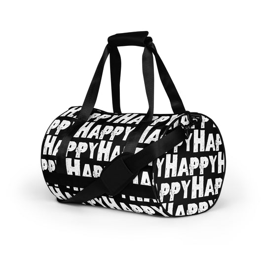 Gym bag Happy sponge print black and white small duffle bag angled side view showing handles padded removable shoulder strap HappyStuff Brand