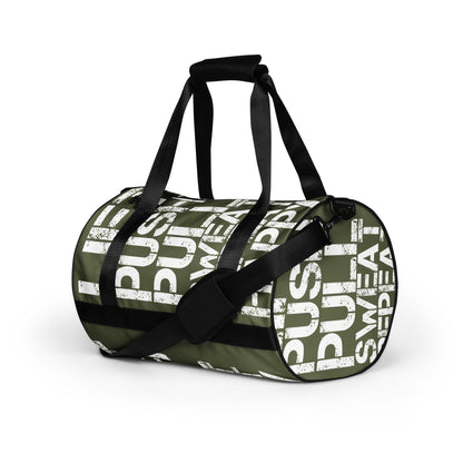 Gym bag khaki green and white all over print Lift Push Pull Sweat Repeat Happy small duffle bag black detail angled side view showing handles and strap HappyStuff Brand