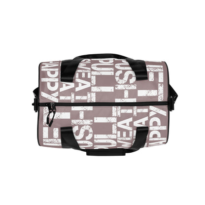 Gym bag overhead view taupe and white all over print Lift Push Pull Sweat Repeat Happy small duffle bag black detail HappyStuff Brand