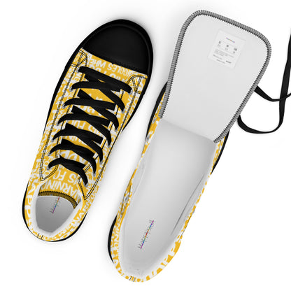 Top view mens sneakers and label HappyStuff yellow high tops with playful white print Warning This Foot Jiggles When Happy black sole