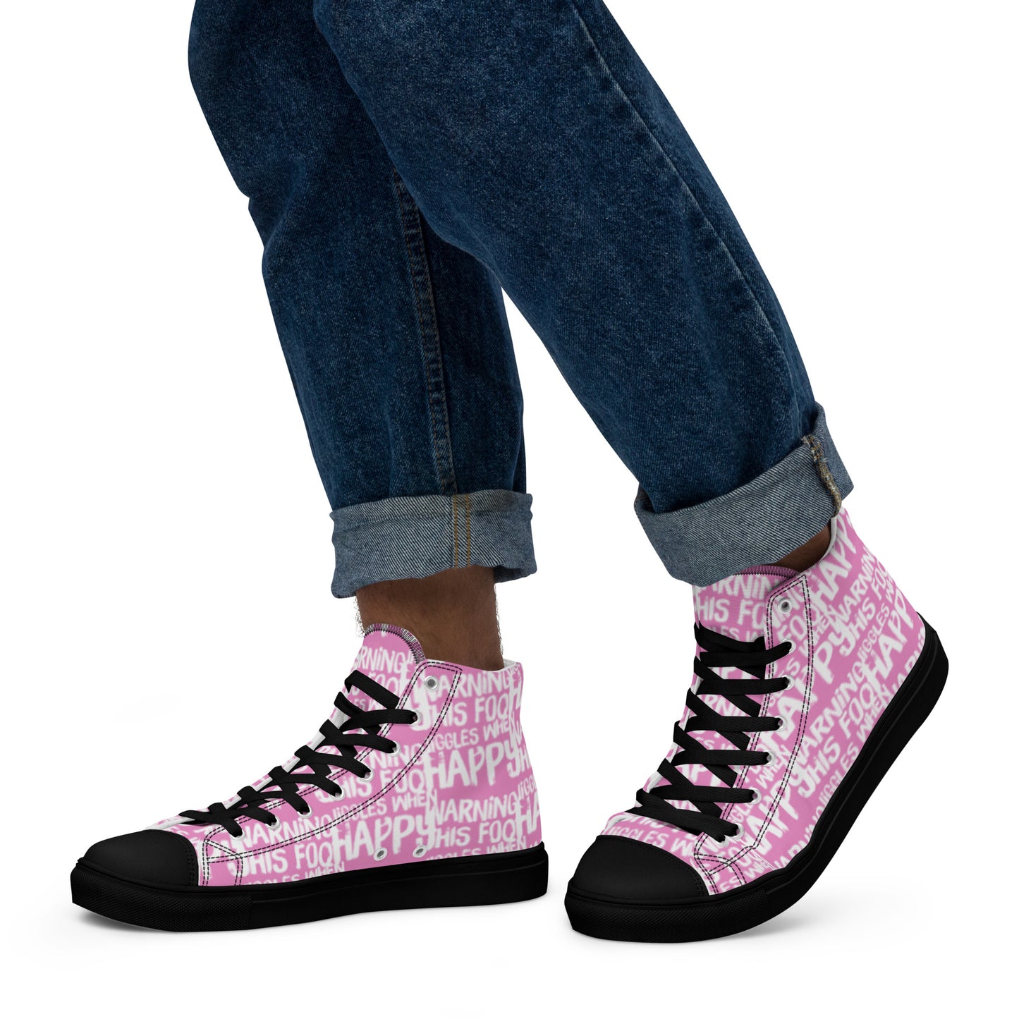 Walking left in mens HappyStuff high tops canvas sneakers edgy print pink and white shoes Warning This Foot Jiggles When Happy black sole