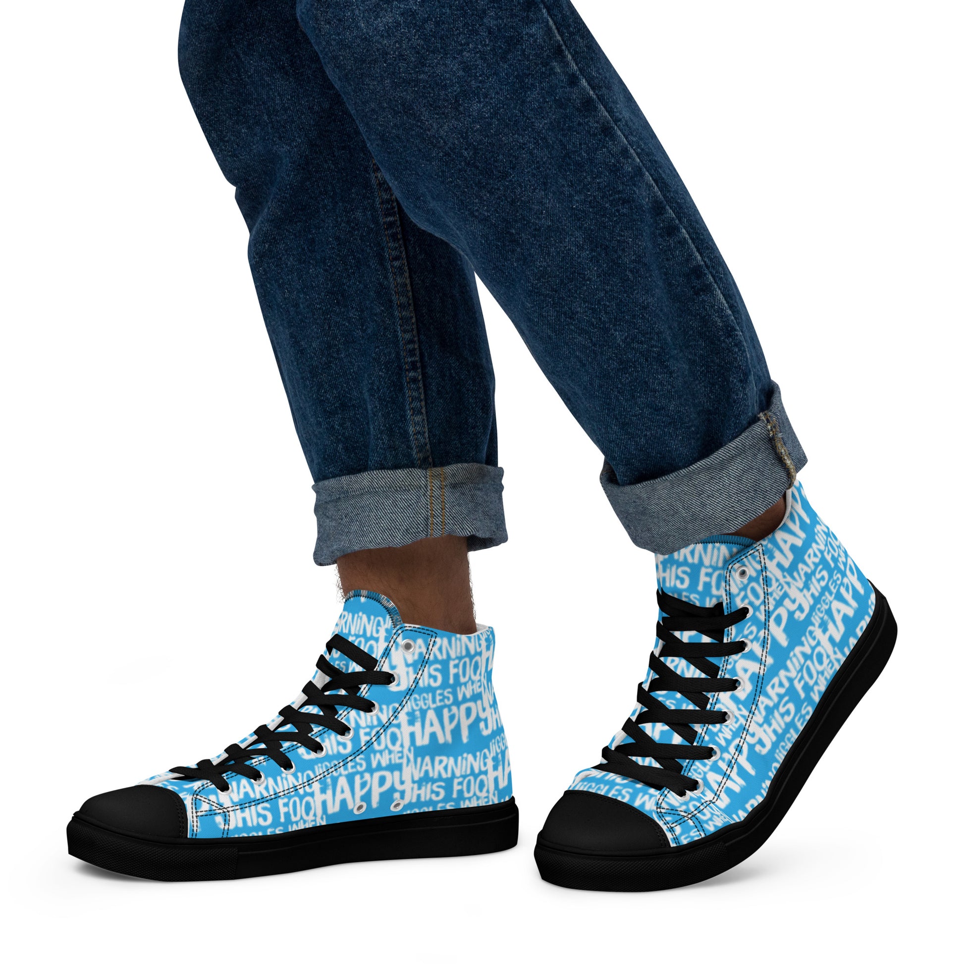 Walking left in mens HappyStuff high tops canvas sneakers edgy print blue and white shoes Warning This Foot Jiggles When Happy black sole