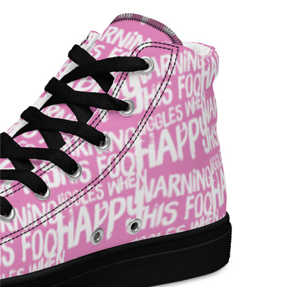 HappyStuff pink high tops with playful white print Warning This Foot Jiggles When Happy black laces faux leather toe cap closeup black sole