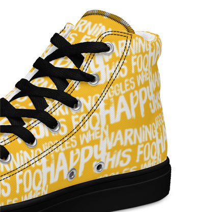 HappyStuff yellow high tops with playful white print Warning This Foot Jiggles When Happy inside heel side closeup view black sole