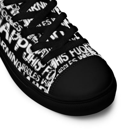 HappyStuff black high tops with playful white print Warning This Foot Jiggles When Happy black laces faux leather toe cap closeup black sole