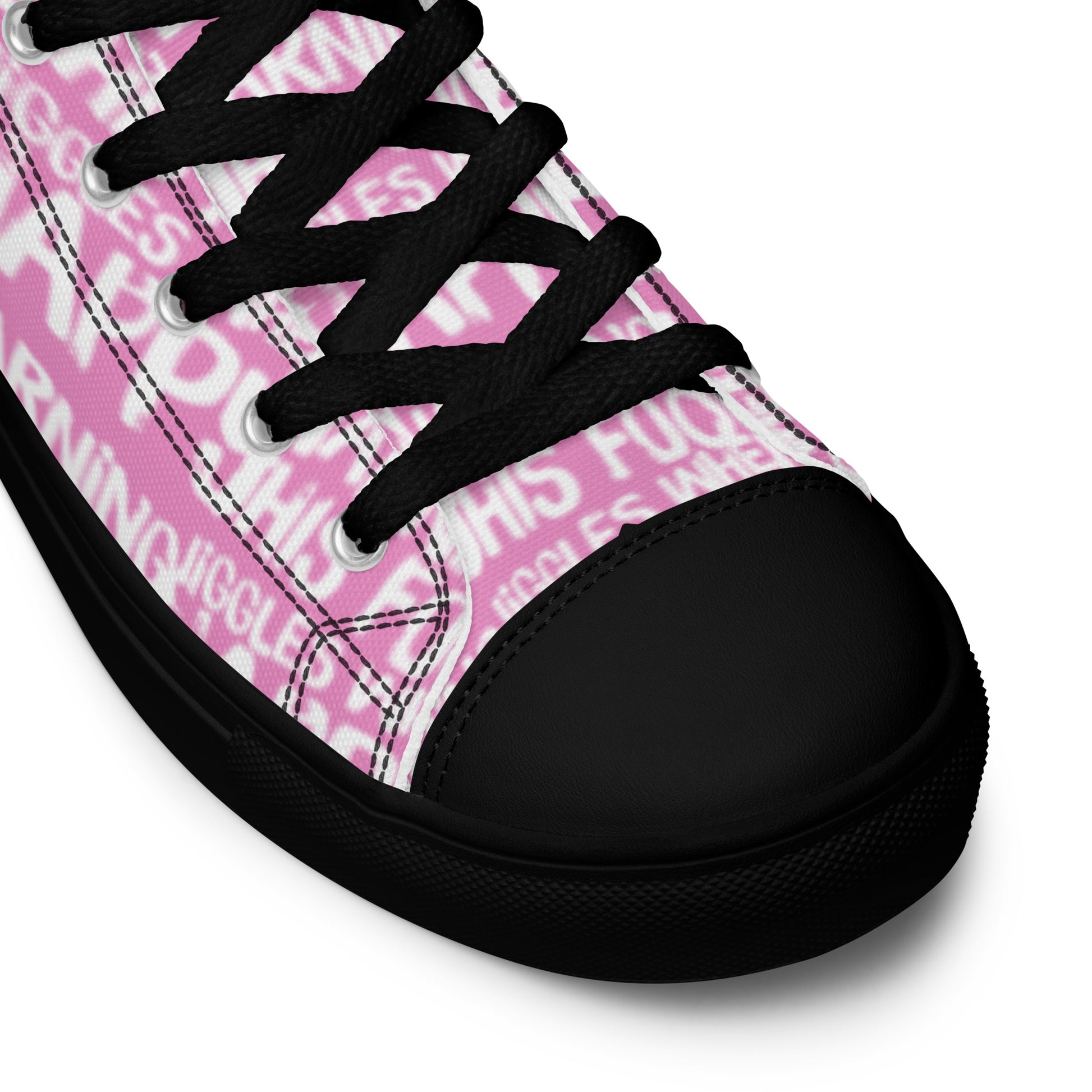 HappyStuff pink high tops with playful white print Warning This Foot Jiggles When Happy inside heel side closeup view black sole