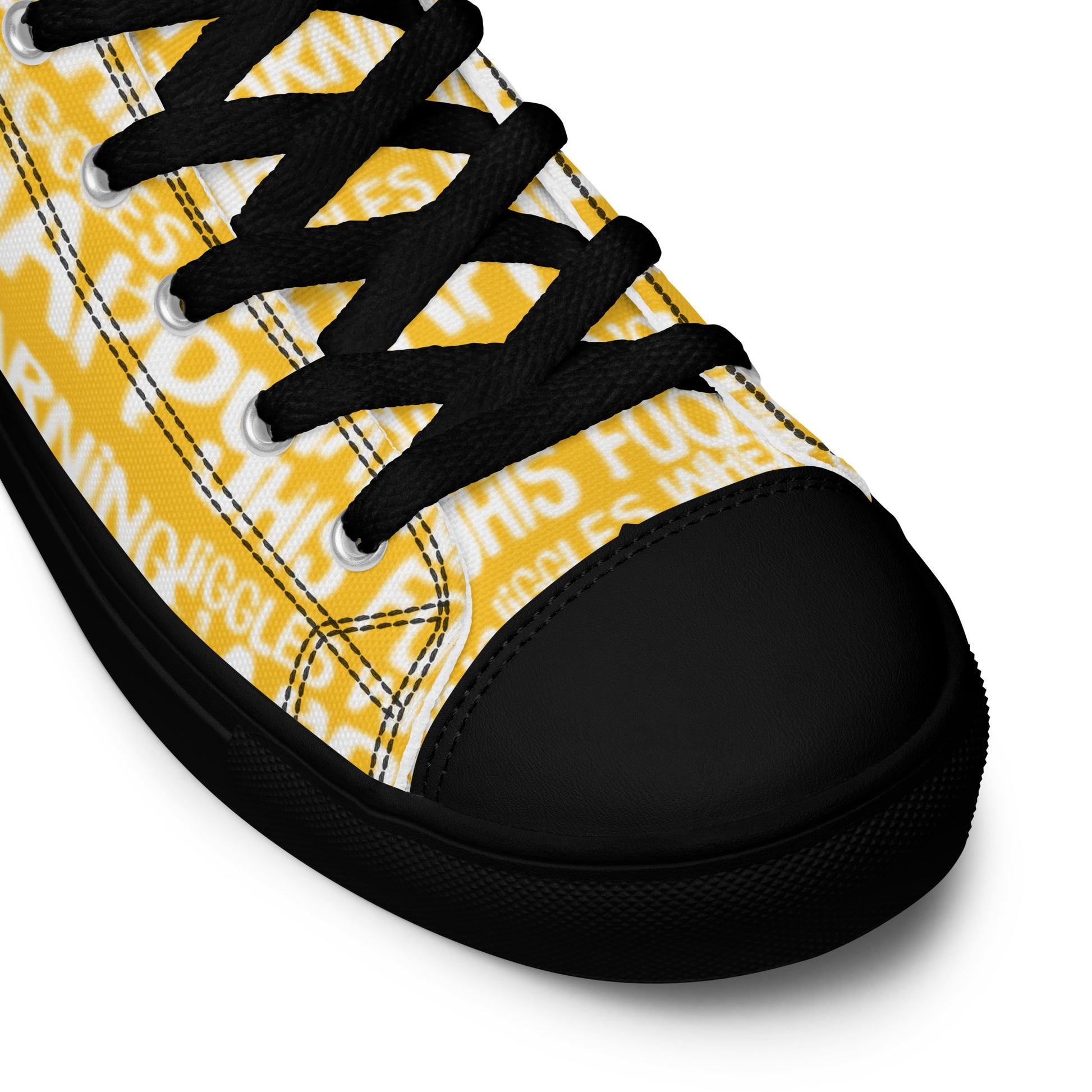 HappyStuff yellow high tops with playful white print Warning This Foot Jiggles When Happy black laces faux leather toe cap closeup black sole