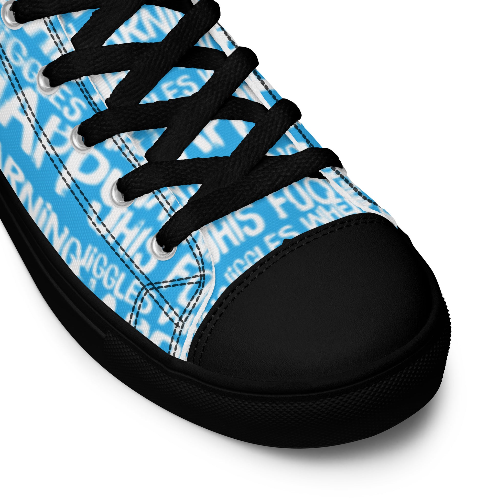 HappyStuff blue high tops with playful white print Warning This Foot Jiggles When Happy black laces faux leather toe cap closeup black sole