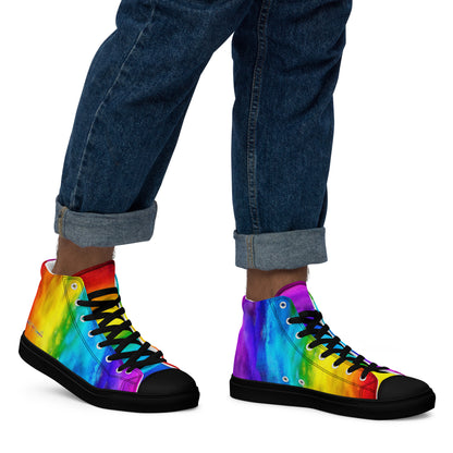 Close up of rainbow shoes on a man walking right holi colours printed on white high tops HappyStuff mens sneakers fun shoes black sole