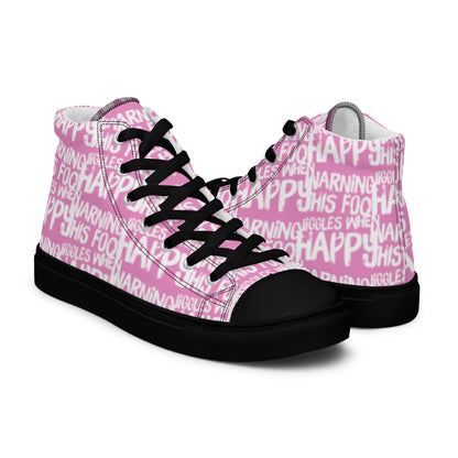 Mens pink high tops with playful white print Warning This Foot Jiggles When Happy right shoe front view left shoe back view black sole