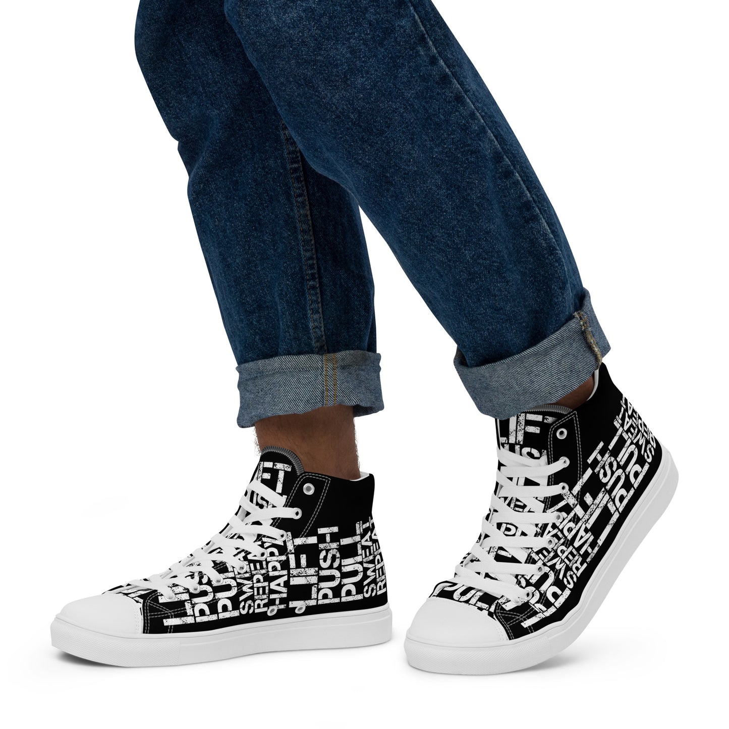 Walking left in mens HappyStuff high tops black canvas sneakers lift push pull sweat repeat happy distress print each on relevant shoe