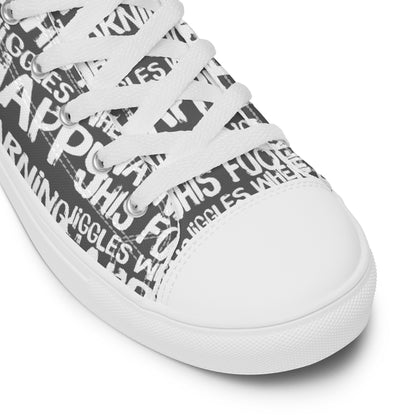 HappyStuff slate grey high tops with playful white print Warning This Foot Jiggles When Happy white laces faux leather toe cap closeup