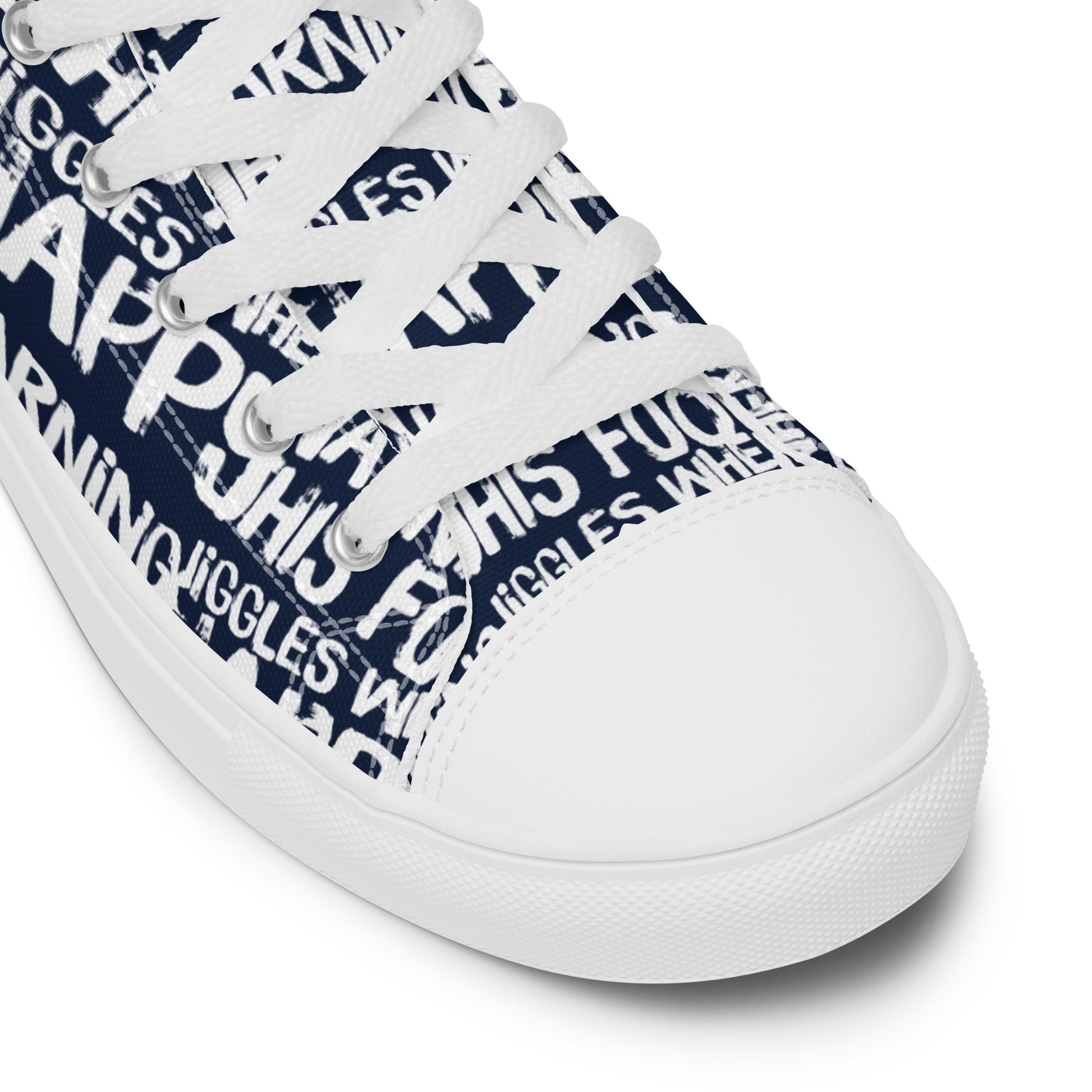 HappyStuff navy blue high tops with playful white print Warning This Foot Jiggles When Happy white laces faux leather toe cap closeup