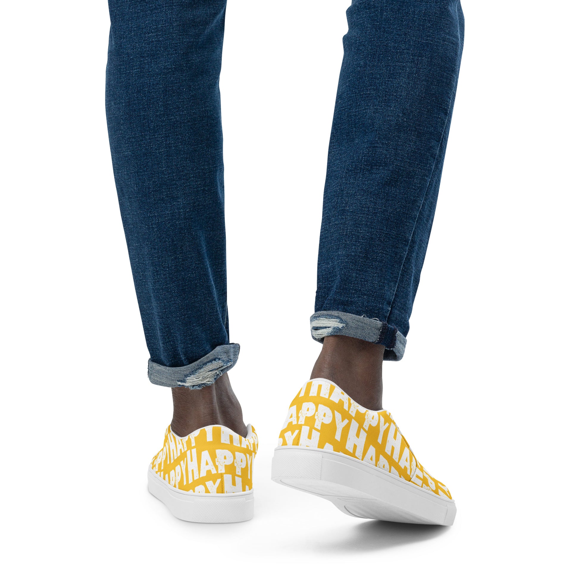 Mans feet wearing quality handmade Deck Shoes front view fun yellow and white slip on shoes Happy Sponge Printed HappyStuff brand