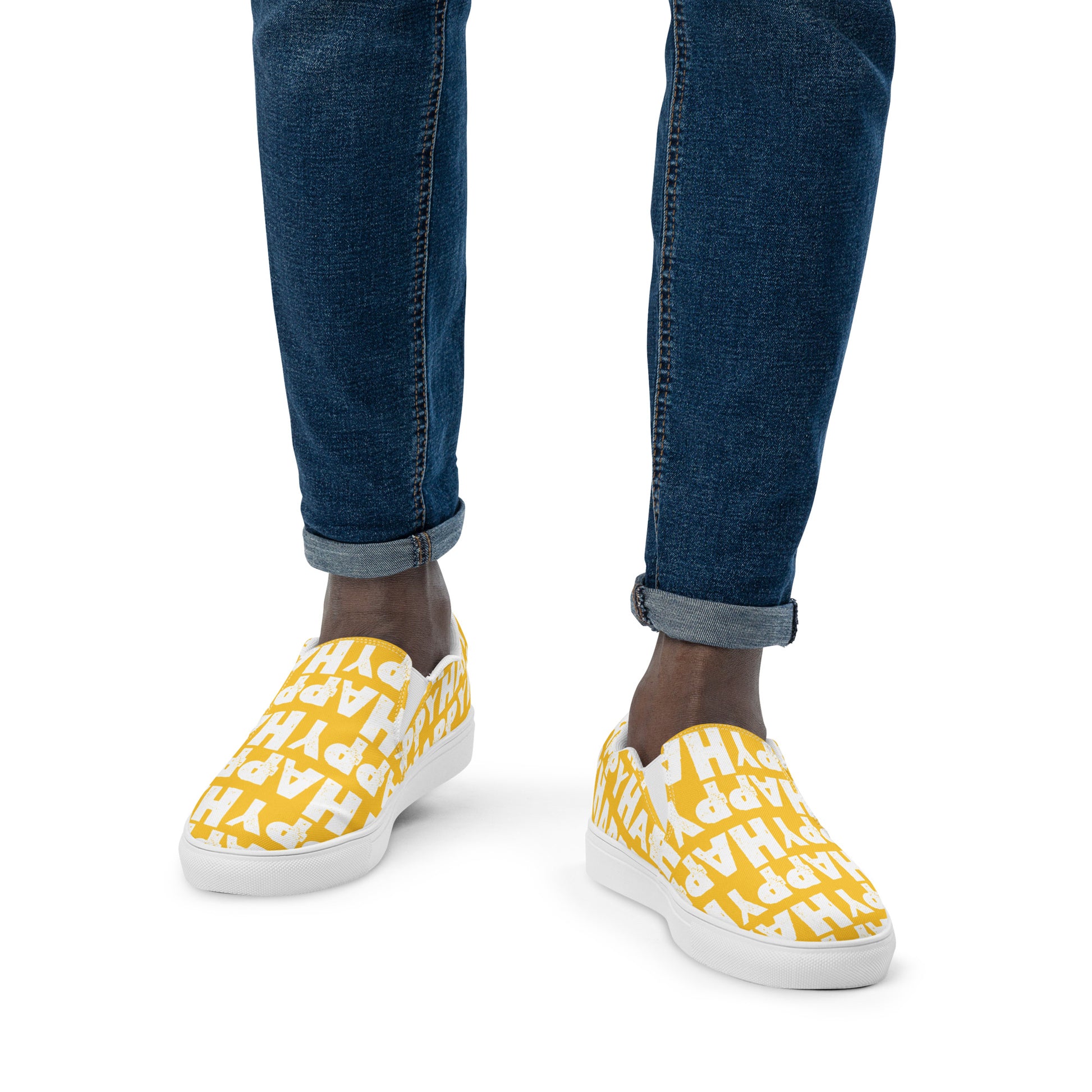 Mans feet wearing quality handmade Deck Shoes front view fun yellow and white slip on shoes Happy Sponge Printed HappyStuff brand