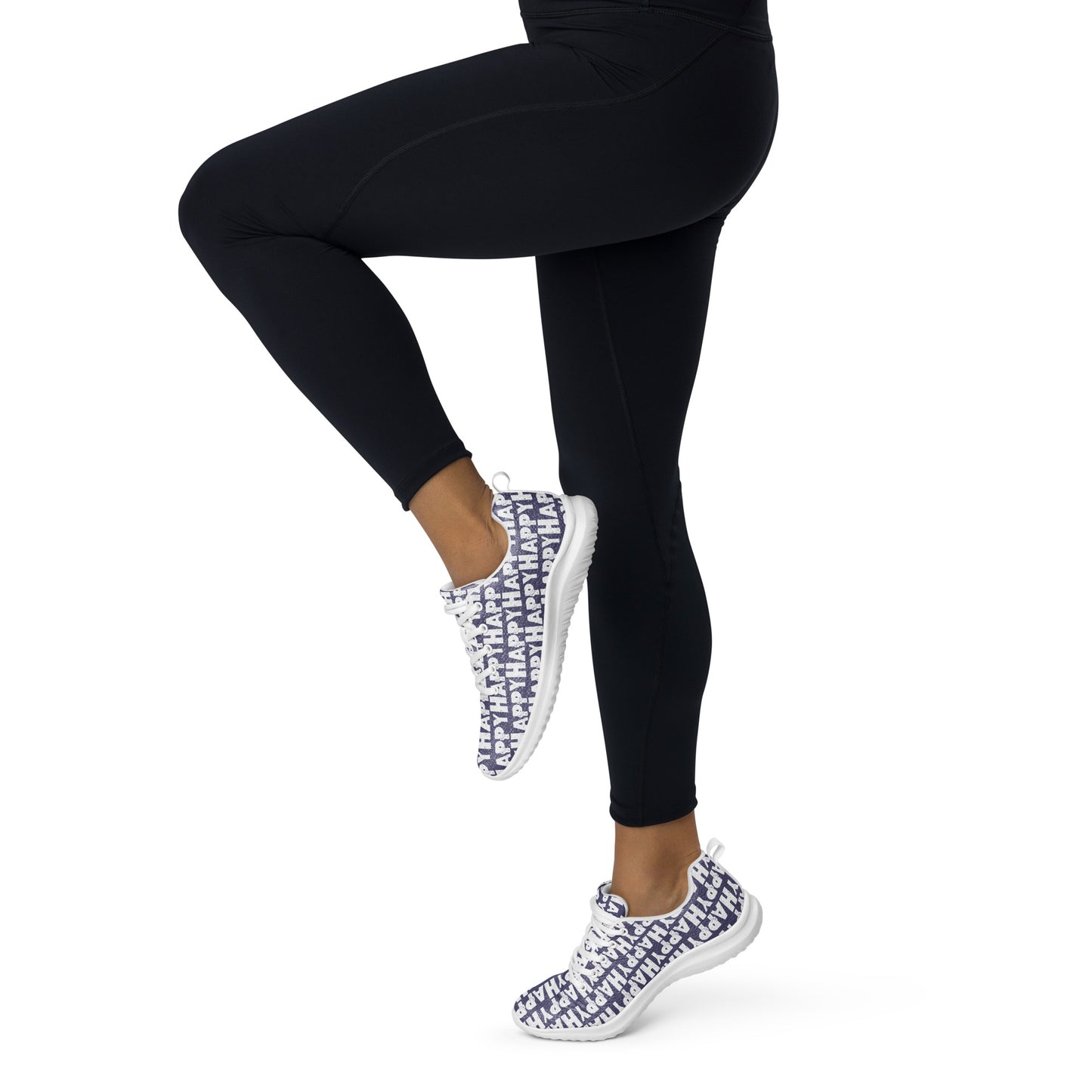 Happy Sponge Print lightweight blue sneakers HappyStuff brand athletic shoes worn by a woman in tights prancing away to the left