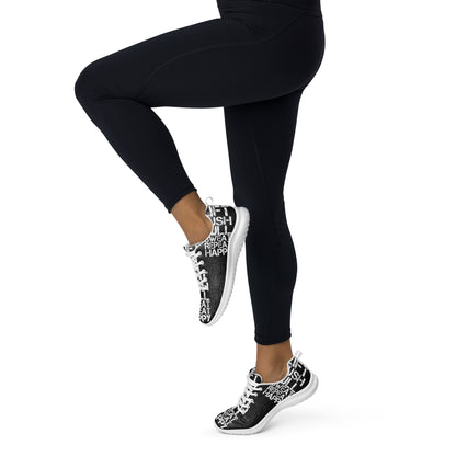 Lightweight black sneakers athletic shoes woman in tights prancing away to the left white lift push pull sweat repeat happy distress print