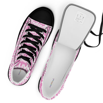 Top view womens sneakers and label HappyStuff pink high tops with playful white print Warning This Foot Jiggles When Happy black sole