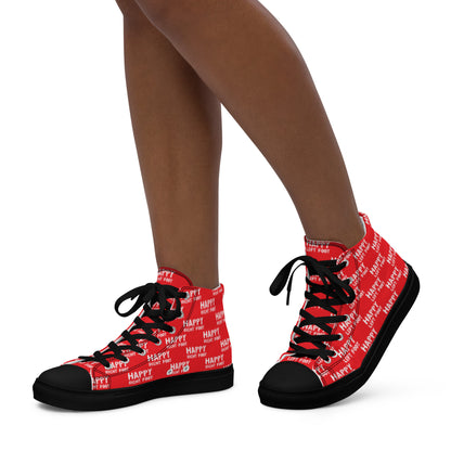 Walking left in womens HappyStuff high tops red canvas sneakers black sole Happy Left Foot Happy Right Foot Pattern Print each on relevant shoe