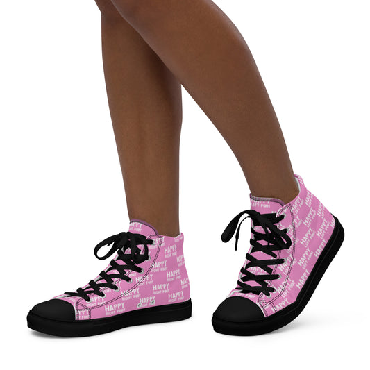 Walking left in womens HappyStuff high tops pink canvas sneakers black sole Happy Left Foot Happy Right Foot Pattern Print each on relevant shoe