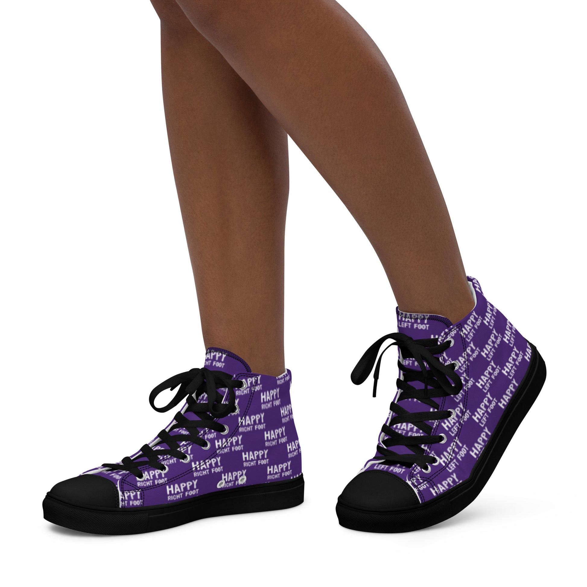 Walking left in womens HappyStuff high tops purple canvas sneakers black sole Happy Left Foot Happy Right Foot Pattern Print each on relevant shoe