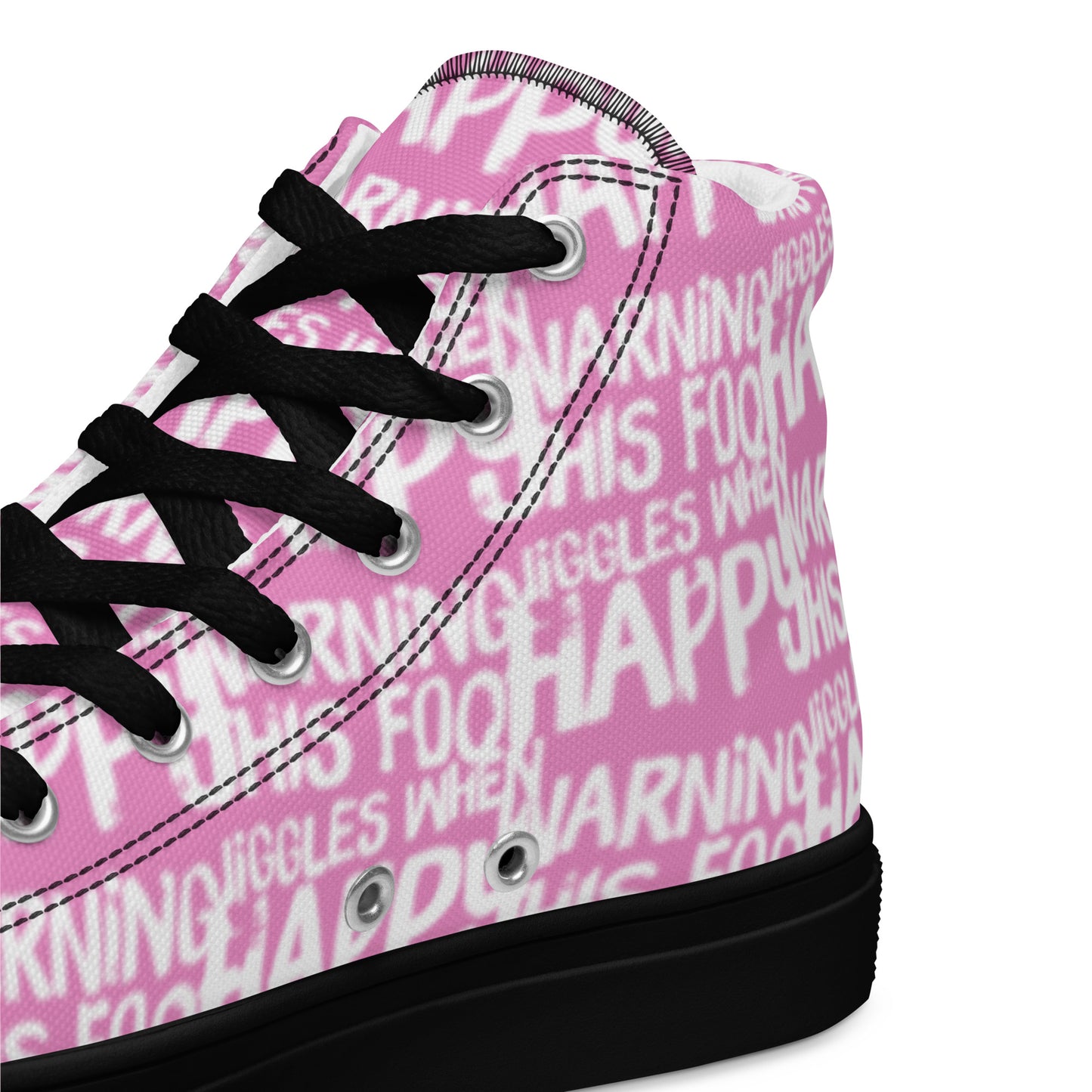 HappyStuff pink high tops with playful white print Warning This Foot Jiggles When Happy inside heel side closeup view black sole