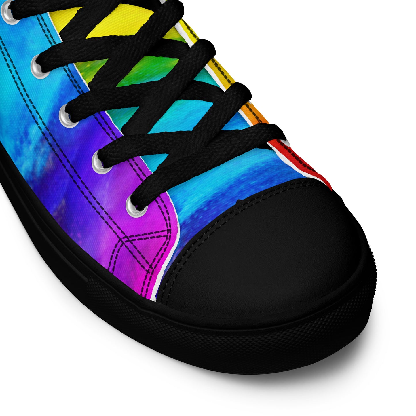 HappyStuff sneakers rainbow shoes holi colours printed on white high tops black sole with black laces black faux leather toe cap close up view