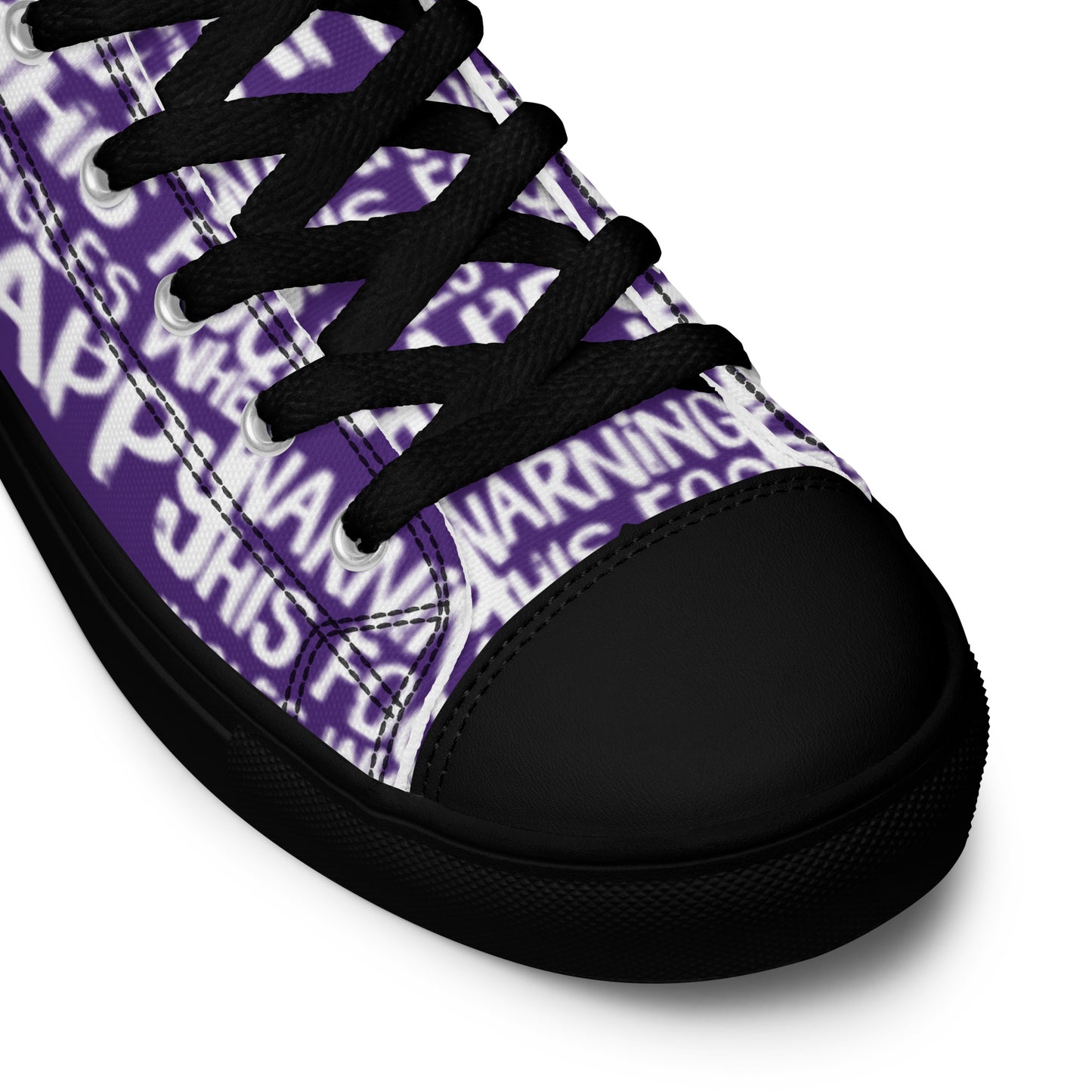 HappyStuff purple high tops with playful white print Warning This Foot Jiggles When Happy black laces faux leather toe cap closeup black sole