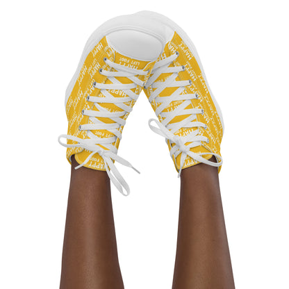 Womans sneaker clad feet in the air tapping toes of her high tops Happy Left Foot Happy Right Foot Pattern Print each on relevant shoe yellow and white shoes