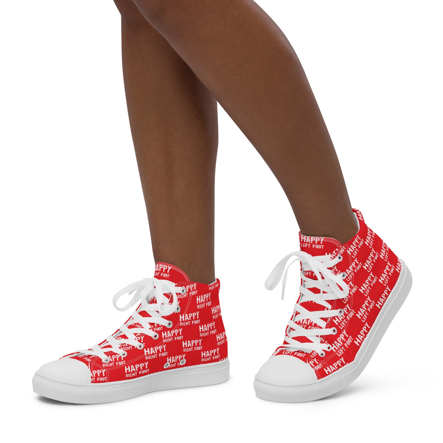 Walking left in womens HappyStuff high tops red canvas sneakers Happy Left Foot Happy Right Foot Pattern Print each on relevant shoe