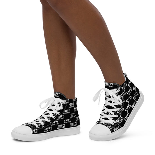 Walking left in womens HappyStuff high tops black canvas sneakers Happy Left Foot Happy Right Foot Pattern Print each on relevant shoe