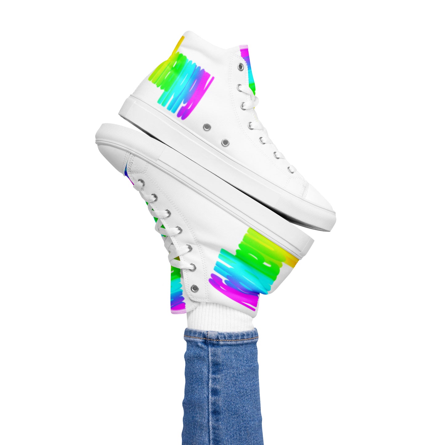 Womans right foot propping up Happy Rainbow Painted bright colour spectrum print white high tops balancing left sneaker atop