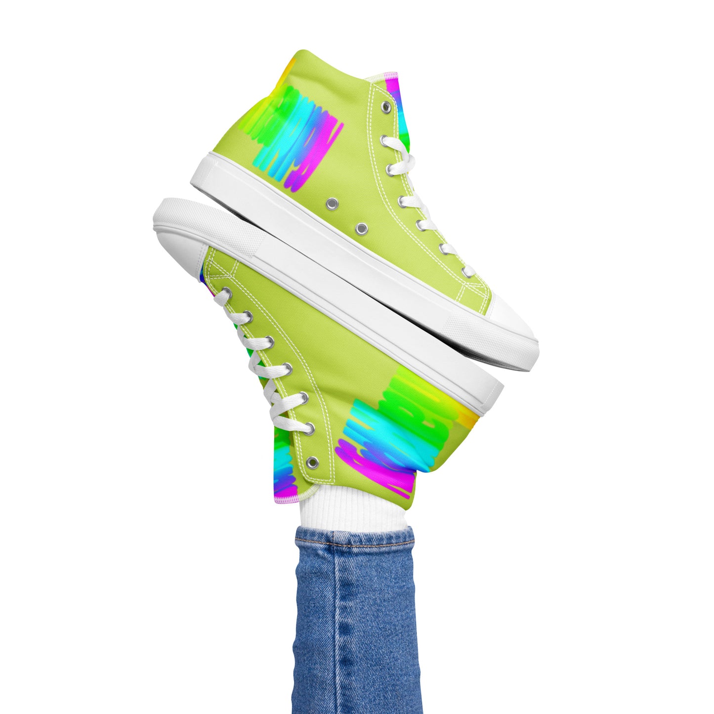 Womans right foot propping up Happy Rainbow Painted bright colour spectrum print green high tops balancing left sneaker atop