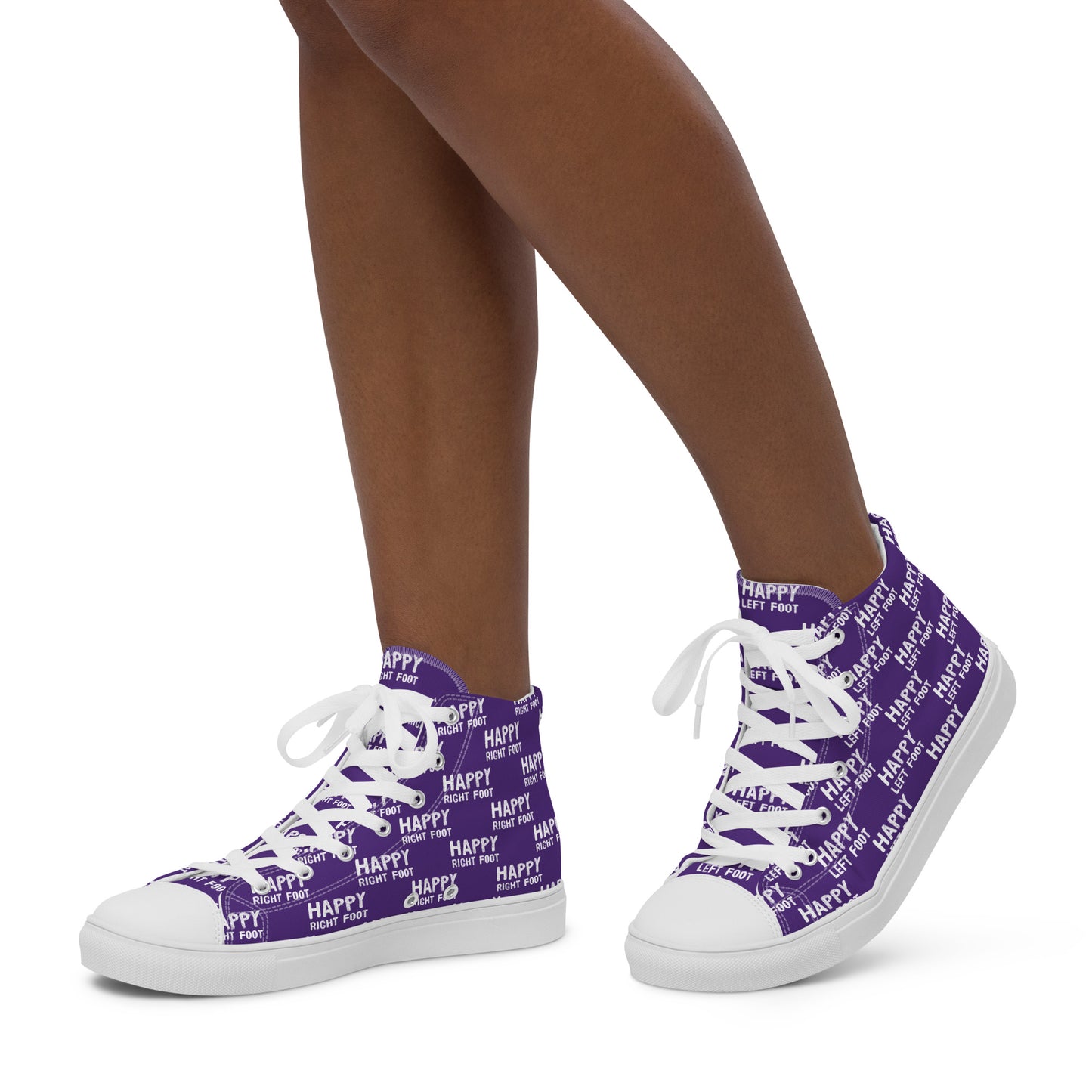 Walking left in womens HappyStuff high tops purple canvas sneakers Happy Left Foot Happy Right Foot Pattern Print each on relevant shoe